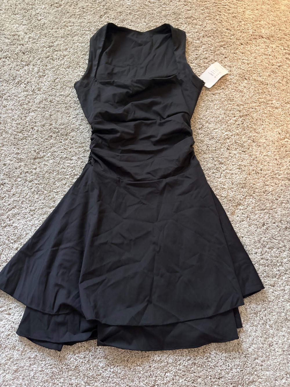 Classic Black Sleeveless Mini Dress with Flared Skirt